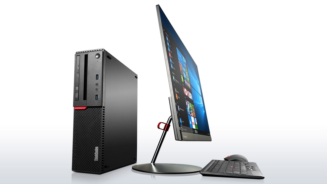   A Lenovo ThinkCentre M700 SFF, angled slightly to the left, a ultra thin LCD monitor, a set of wireless mouse and keyboard 